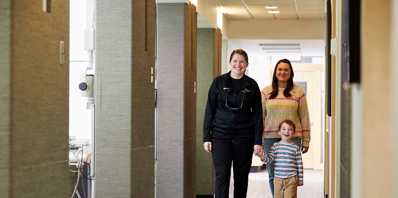 A family walking through the office at Downtown Dental Group in Milwaukee